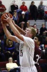 St. Joseph's Prep's Pete Gayhardt controls the rebound, just in front of Abington's Jack Steinman. Gayhardt had 19 rebounds in Prep's 62-45 win. LOU RABITO / Staff