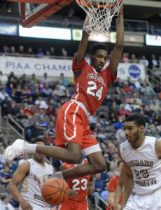Archbishop Carroll's Derrick Jones throws down two of his game-high 30 points Friday night, but it's not enough in a 69-67 win by Neumann-Goretti in the PIAA Class AAA Championships Game at Hershey's Giant Center. (Tom Kelly IV)